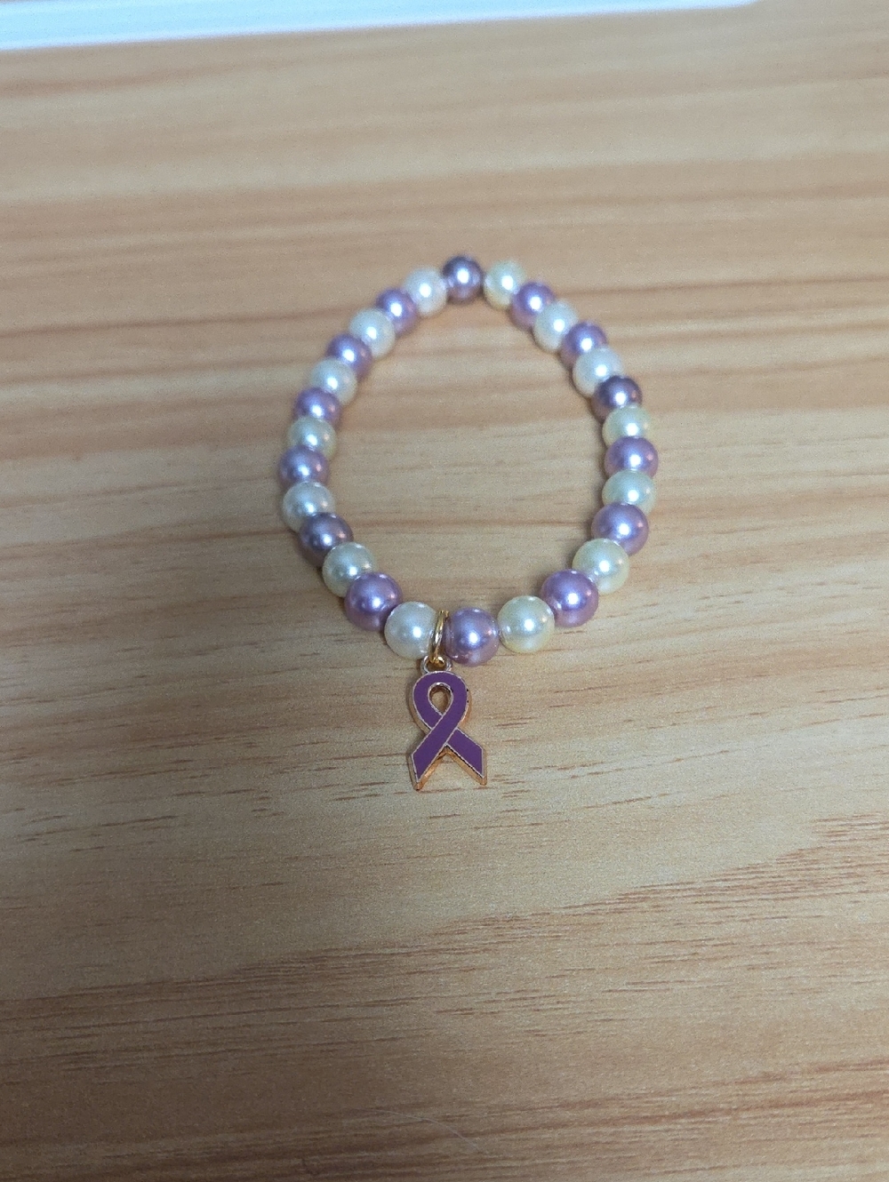 NWOT Purple Ribbon Charm Memory Wire bracelet  1046